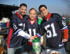 Steiniger men tapping the keg at Ralph Wilson Stadium