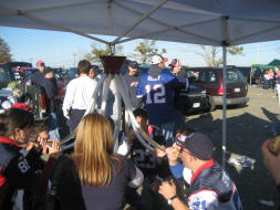 Octo-funnelling a beer, our gameday tradition